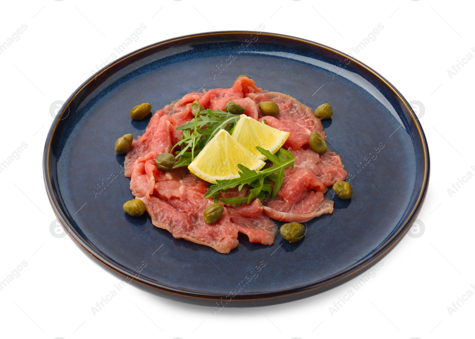 Photo of Fresh beef carpaccio with arugula, lemon and capers isolated on white