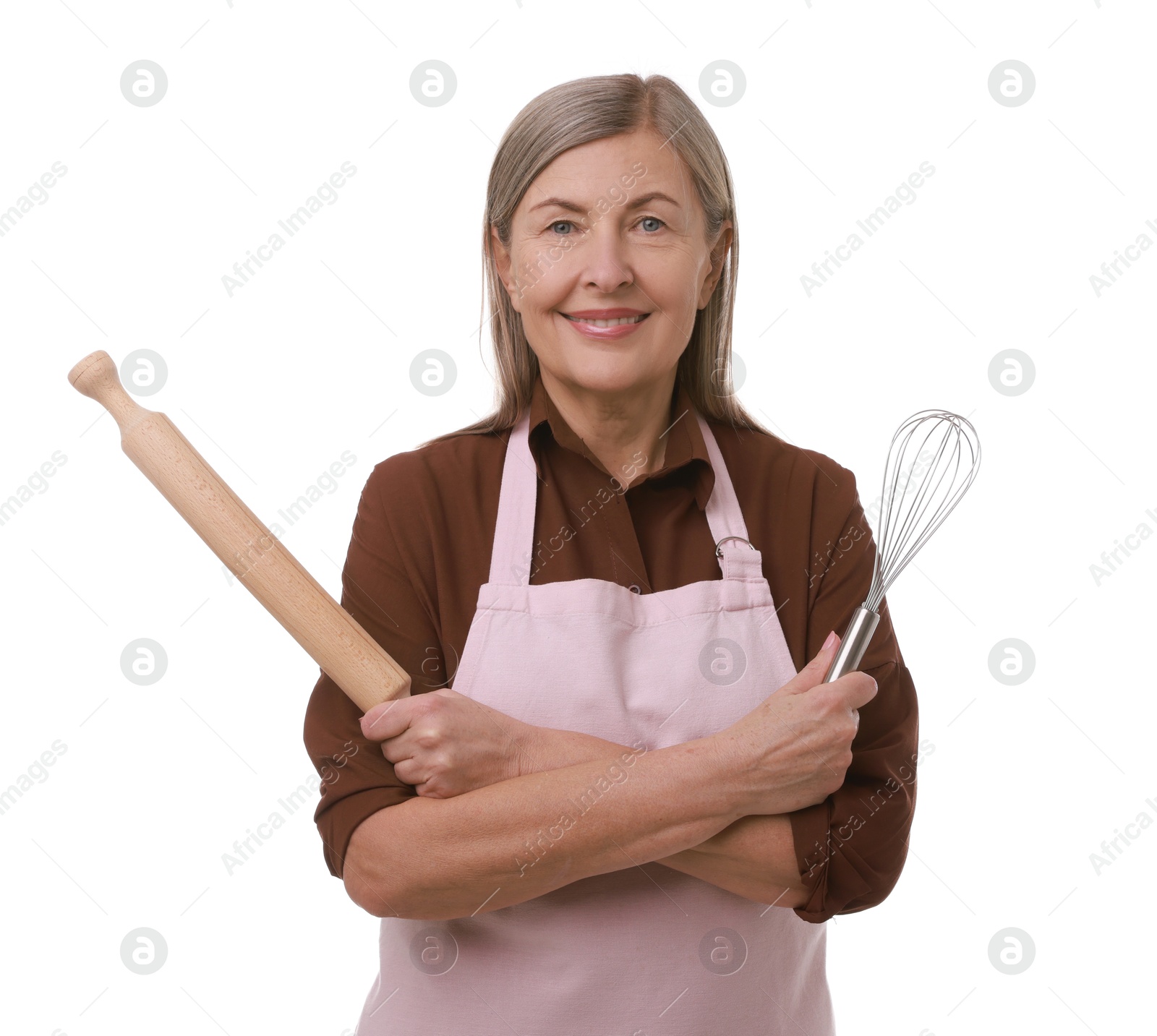 Photo of Happy woman with rolling pin and whisk on white background