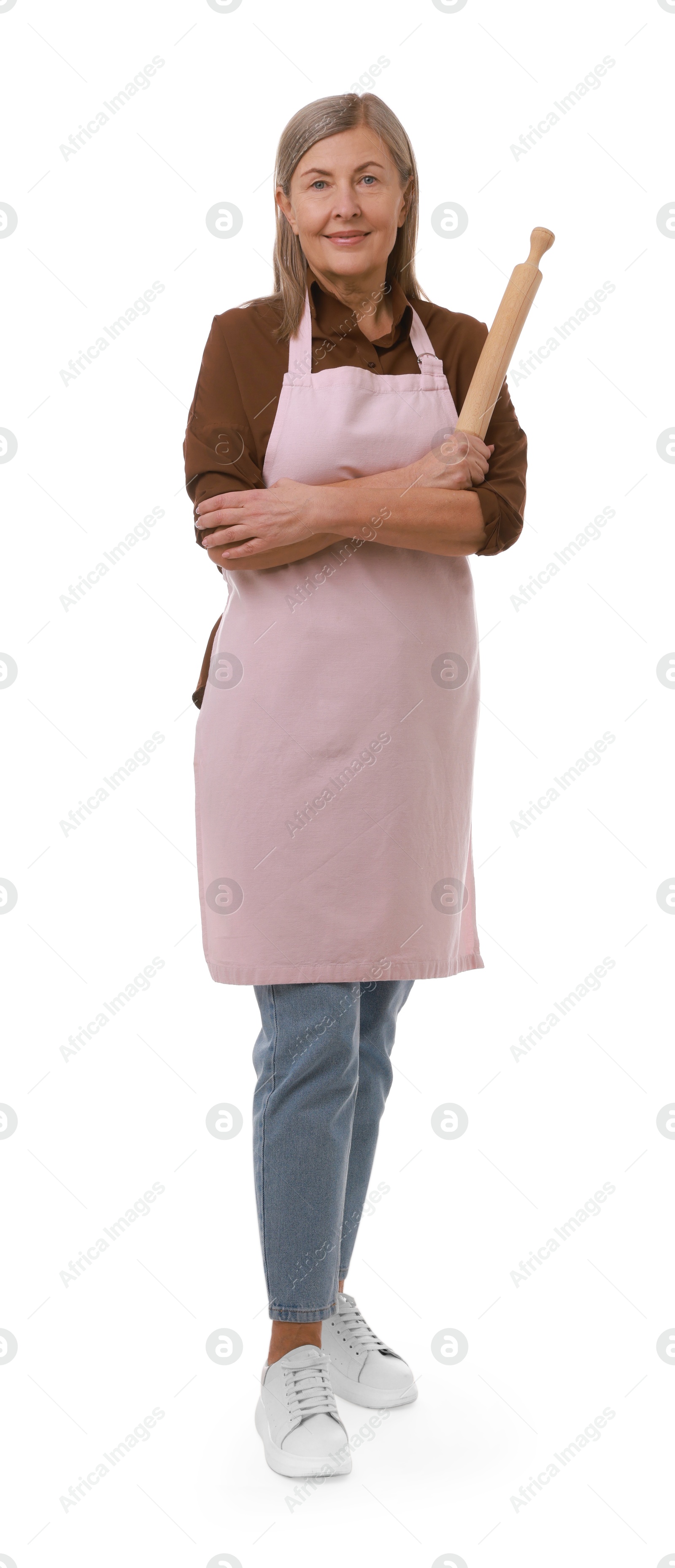 Photo of Happy woman with rolling pin on white background