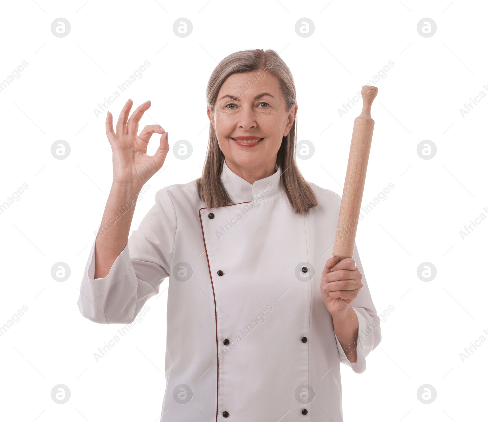 Photo of Happy chef with rolling pin showing ok gesture on white background