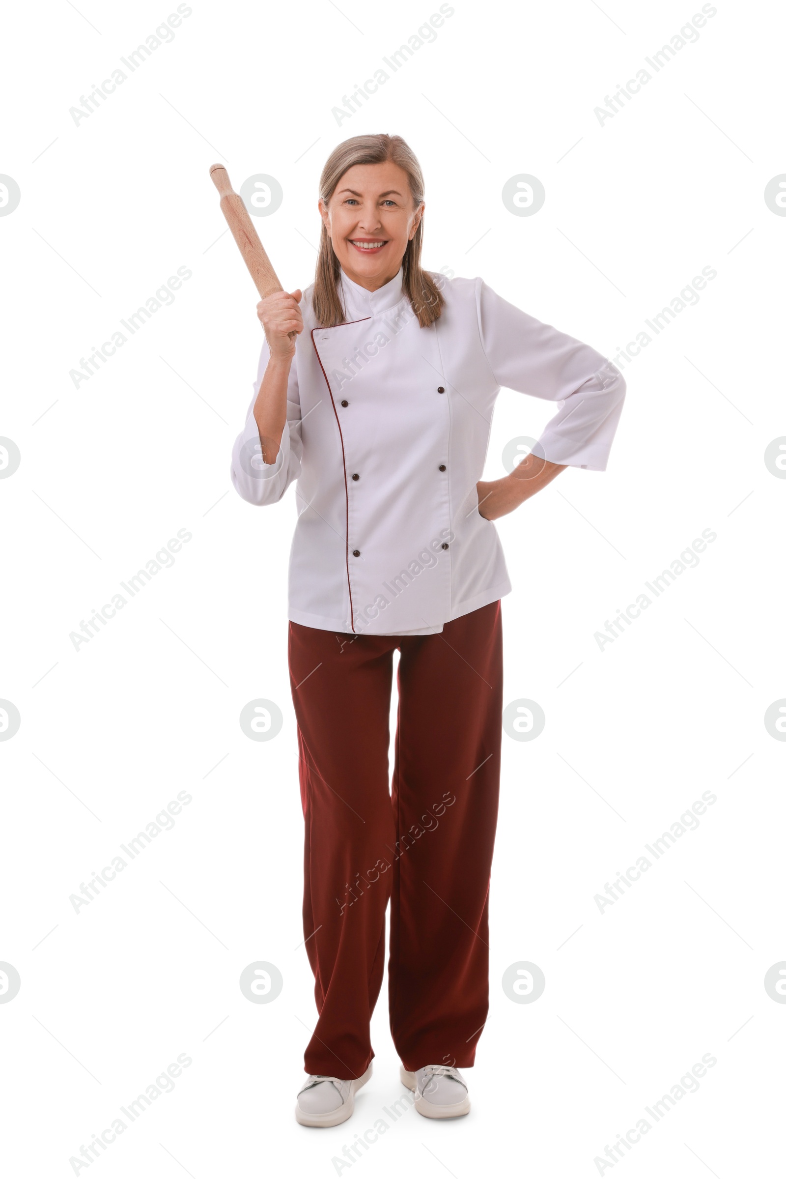 Photo of Happy chef with rolling pin on white background