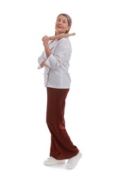 Photo of Chef with rolling pin on white background