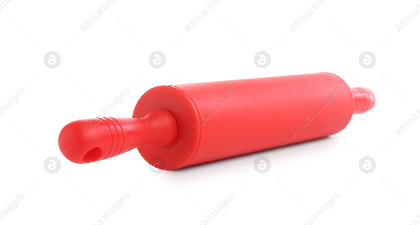 Photo of One red rolling pin isolated on white