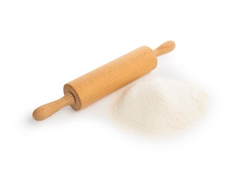 Photo of Wooden rolling pin and pile of flour isolated on white