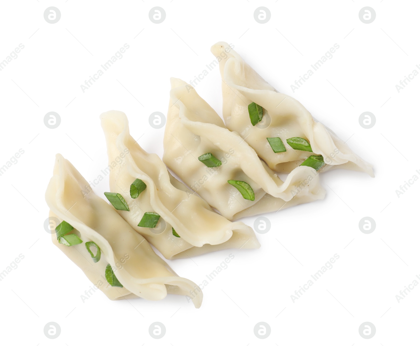 Photo of Fresh gyoza dumplings with pieces of green onion isolated on white, top view