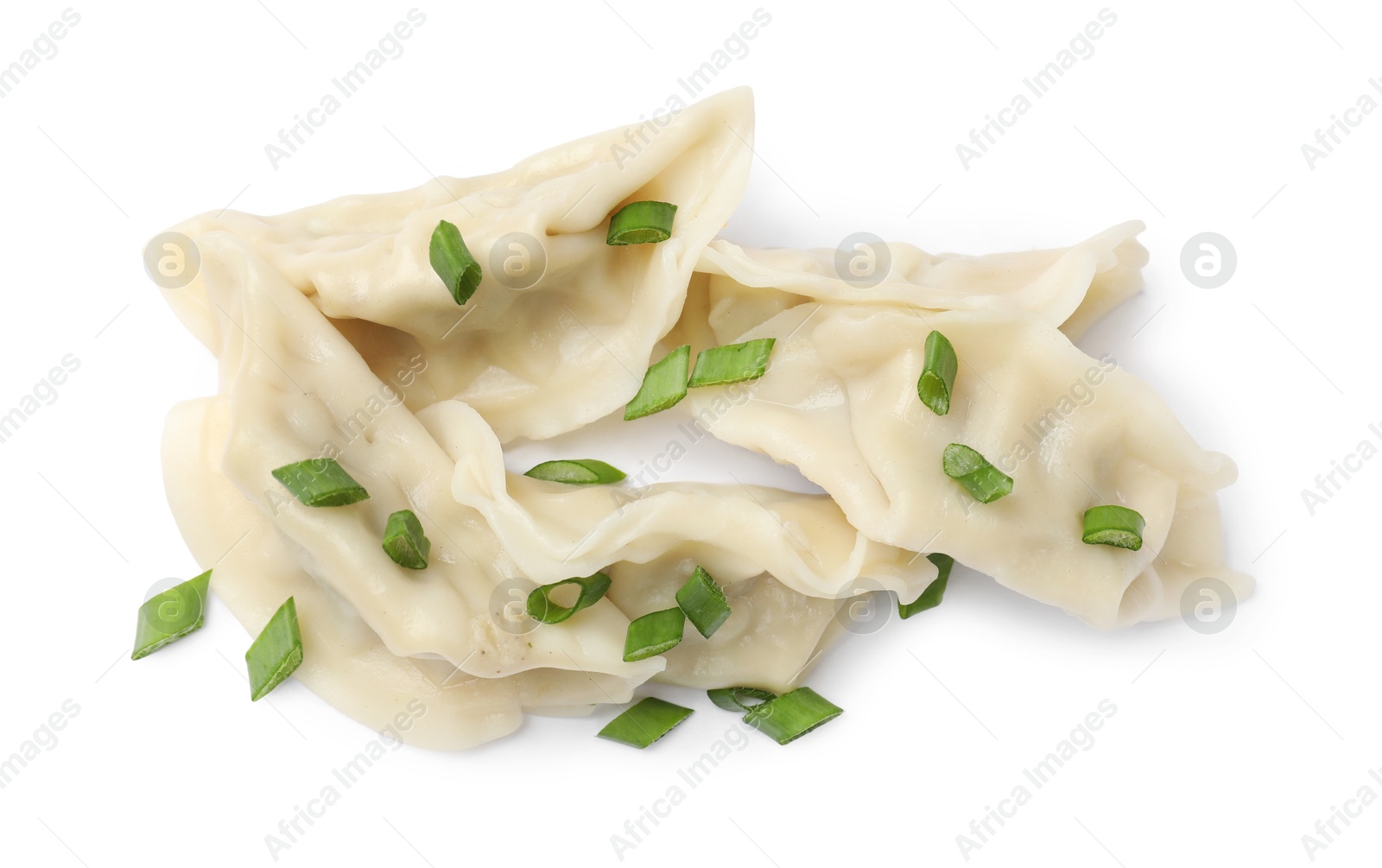 Photo of Fresh gyoza dumplings with pieces of green onion isolated on white, top view