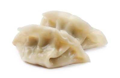 Photo of Fresh gyoza dumplings isolated on white. Chinese cuisine