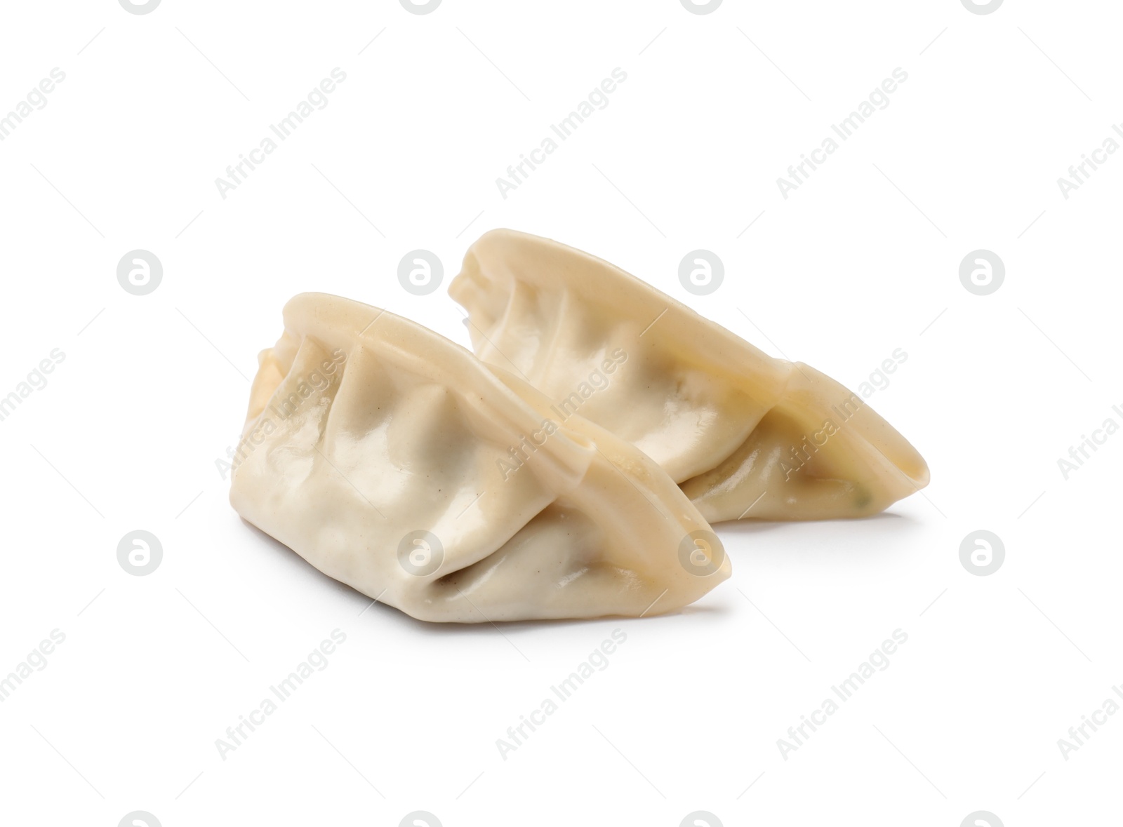 Photo of Fresh gyoza dumplings isolated on white. Chinese cuisine