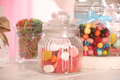 Photo of Candy bar. Many different sweets on white wooden table indoors