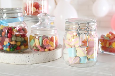 Photo of Candy bar. Many different sweets on white wooden table indoors