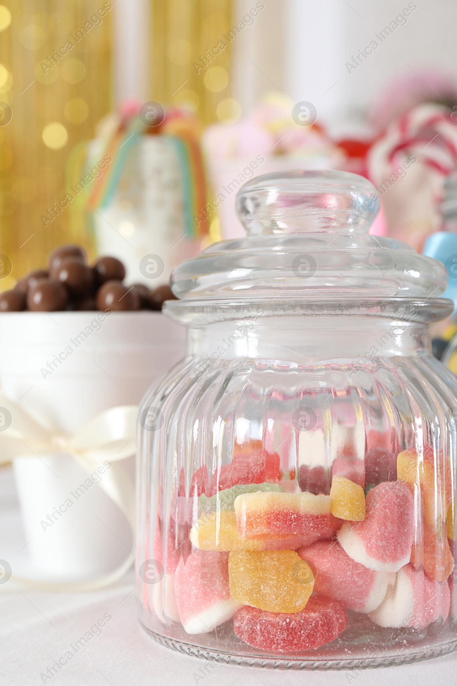 Photo of Candy bar. Many different sweets on white table indoors, closeup