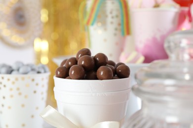 Photo of Candy bar. Many different sweets on blurred background, closeup