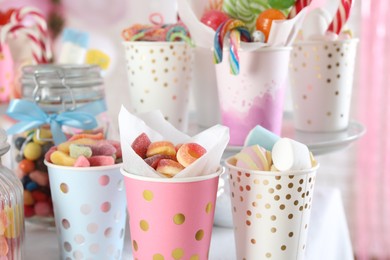 Photo of Candy bar. Many different sweets on table indoors, closeup