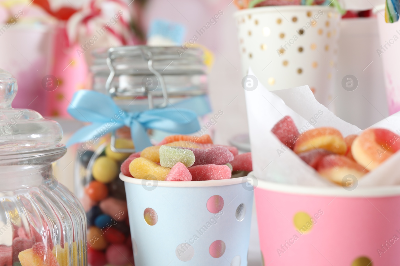 Photo of Candy bar. Many different sweets on blurred background, closeup