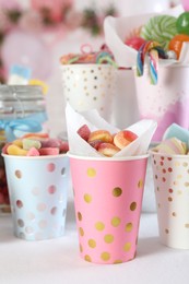 Photo of Candy bar. Many different sweets on table indoors, closeup