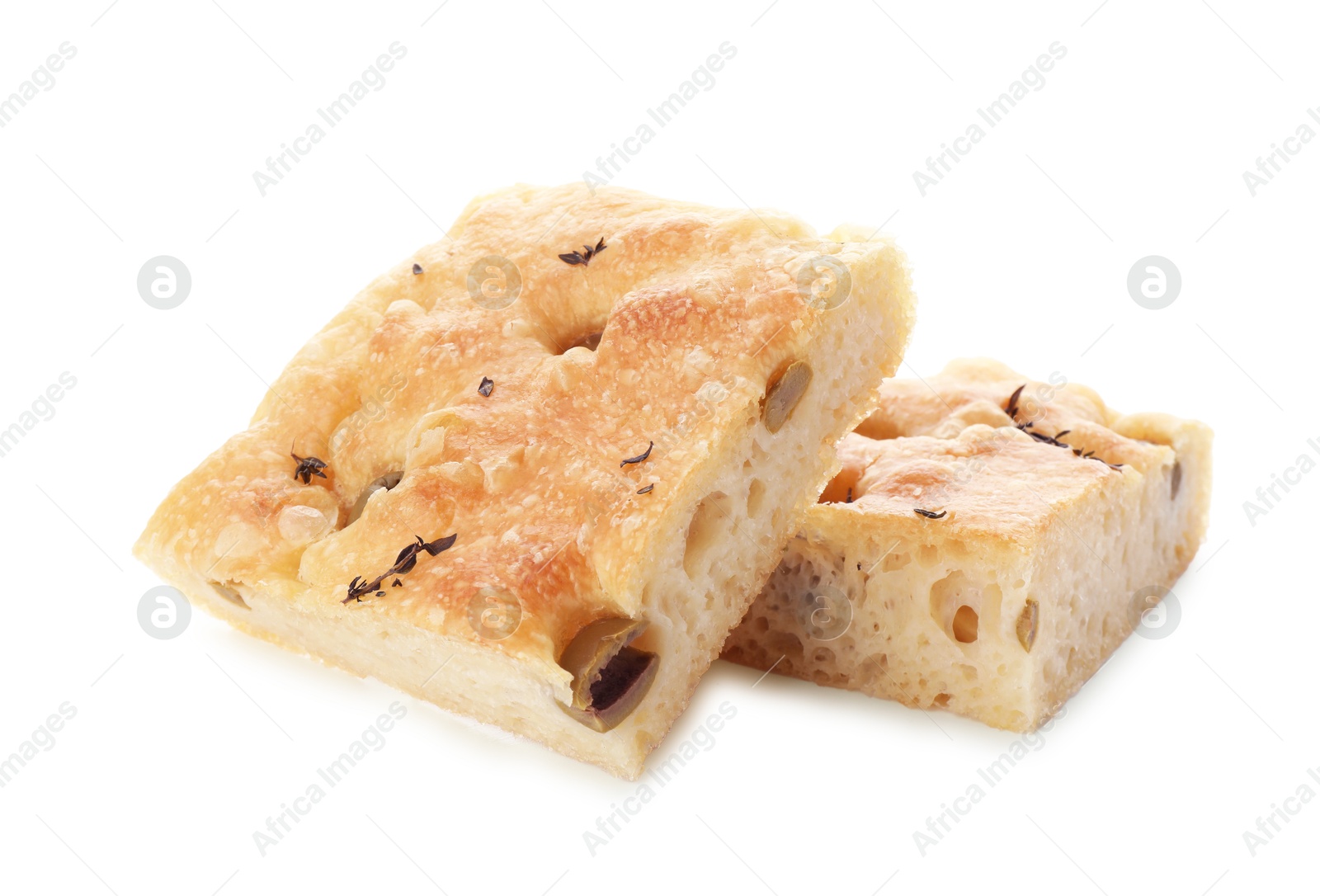 Photo of Pieces of delicious focaccia bread with olives and thyme isolated on white