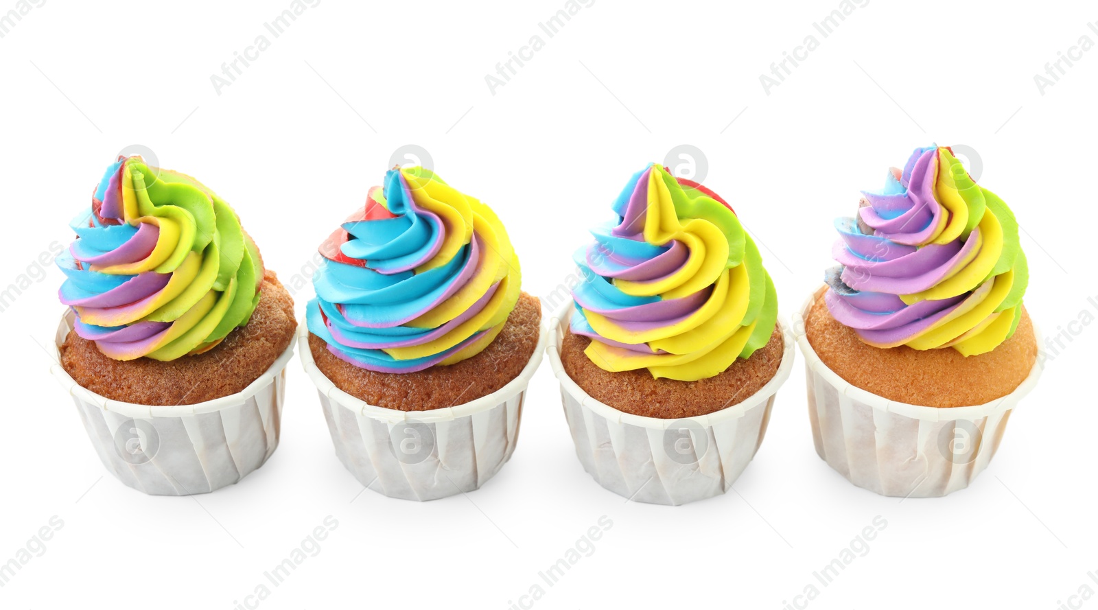 Photo of Tasty cupcakes with colorful cream isolated on white