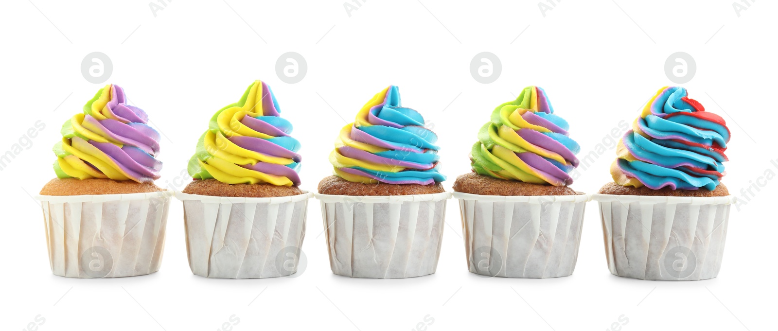 Photo of Tasty cupcakes with colorful cream isolated on white