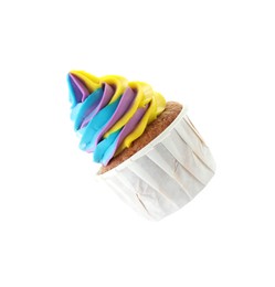 Photo of Tasty cupcake with colorful cream in air isolated on white