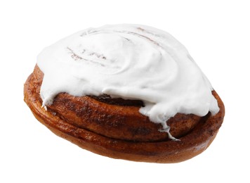 Photo of Tasty cinnamon roll with cream isolated on white