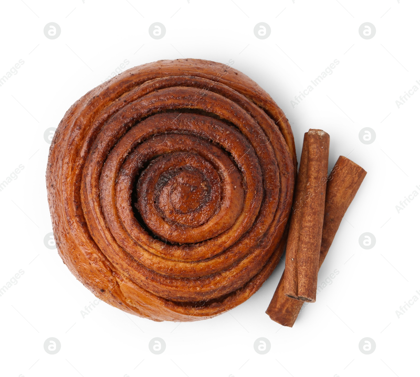 Photo of Tasty cinnamon roll and sticks isolated on white, top view