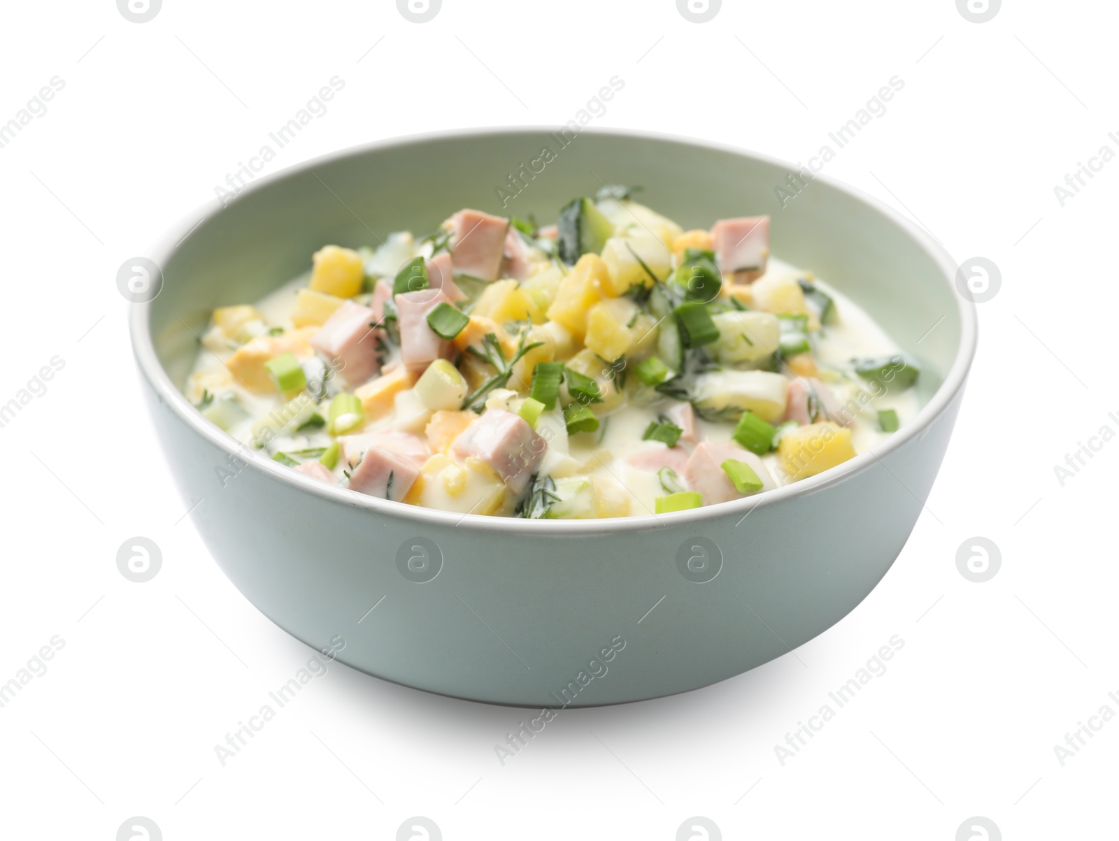 Photo of Delicious okroshka soup in bowl isolated on white