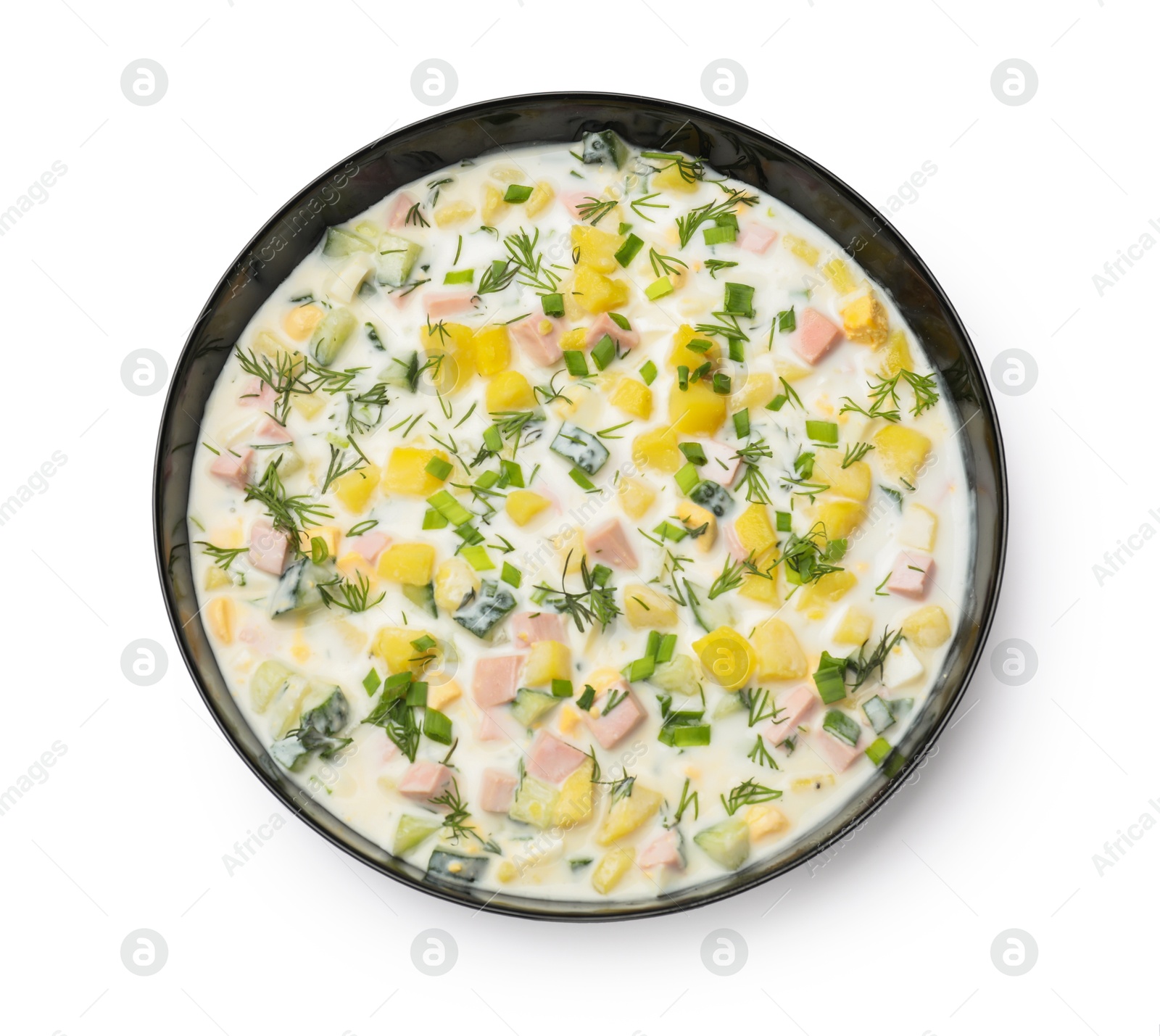 Photo of Delicious okroshka soup with kefir in bowl isolated on white