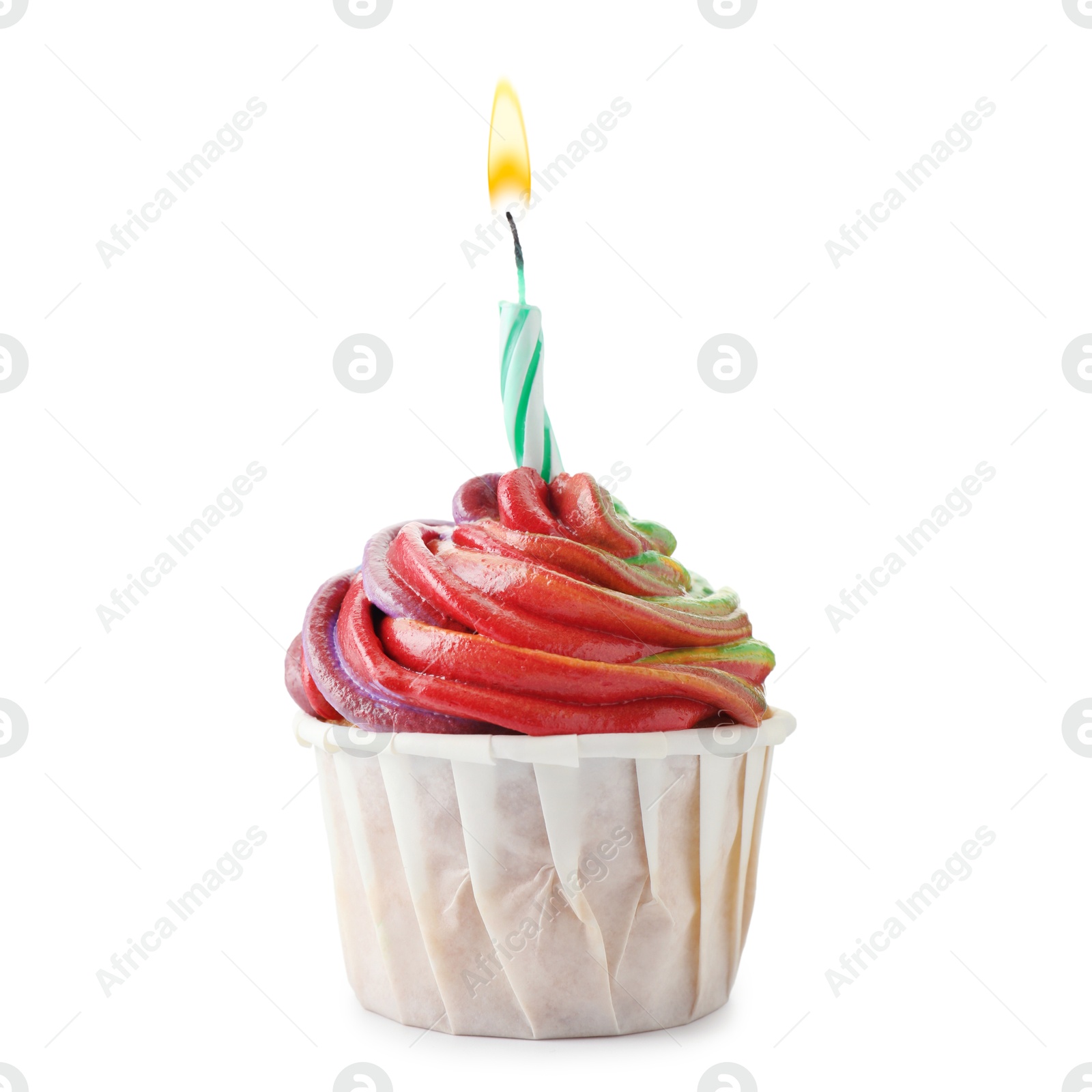 Photo of Delicious cupcake with colorful cream and candle isolated on white