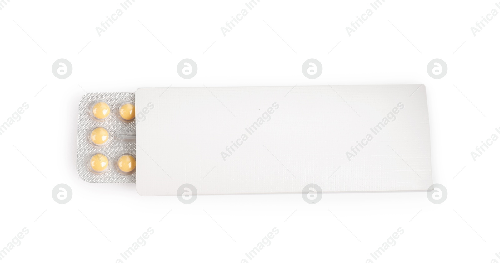 Photo of Blister of contraceptive pills in package isolated on white, top view. Mockup for design