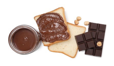 Photo of Tasty sandwiches with chocolate butter, pieces of chocolate and hazelnuts isolated on white, top view