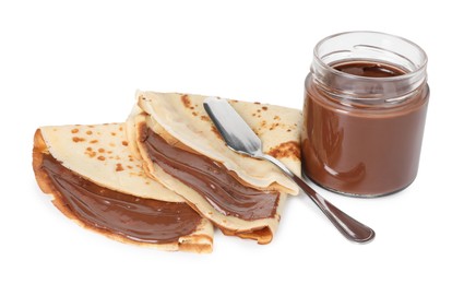 Photo of Tasty crepes with chocolate butter and knife isolated on white