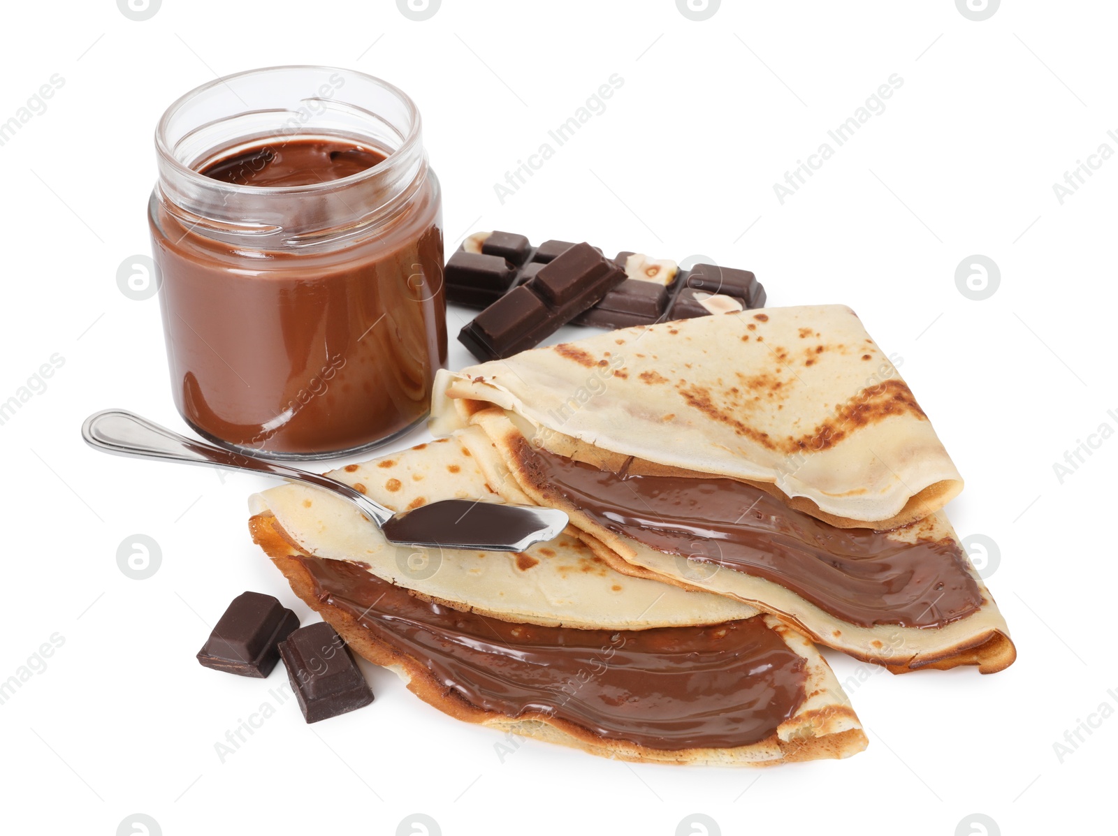 Photo of Tasty crepes with chocolate butter and pieces of chocolate isolated on white