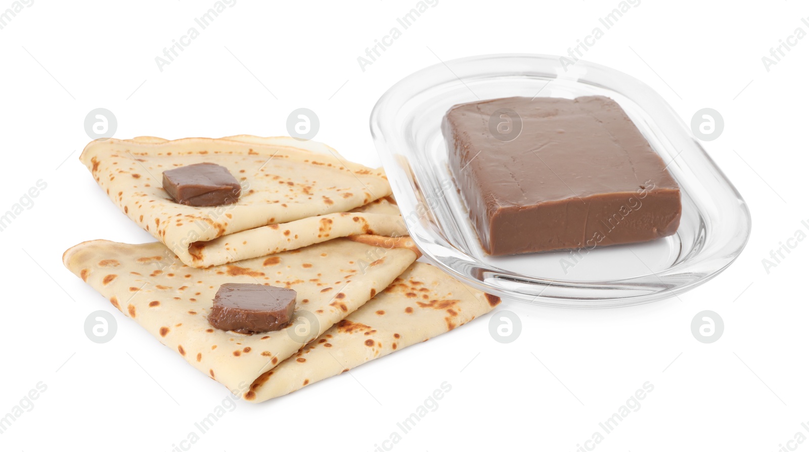 Photo of Tasty crepes with chocolate butter isolated on white