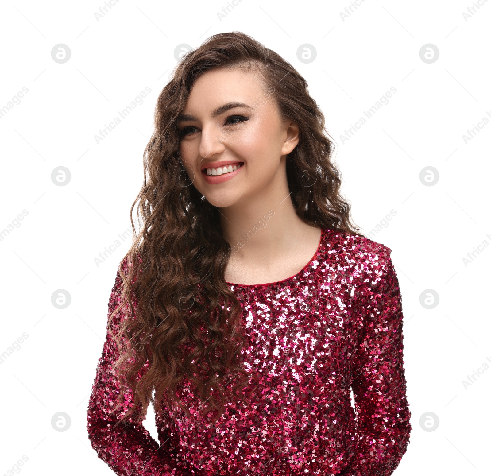 Photo of Beautiful young woman with long curly brown hair in pink sequin dress on white background