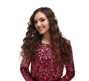 Photo of Beautiful young woman with long curly brown hair in pink sequin dress on white background