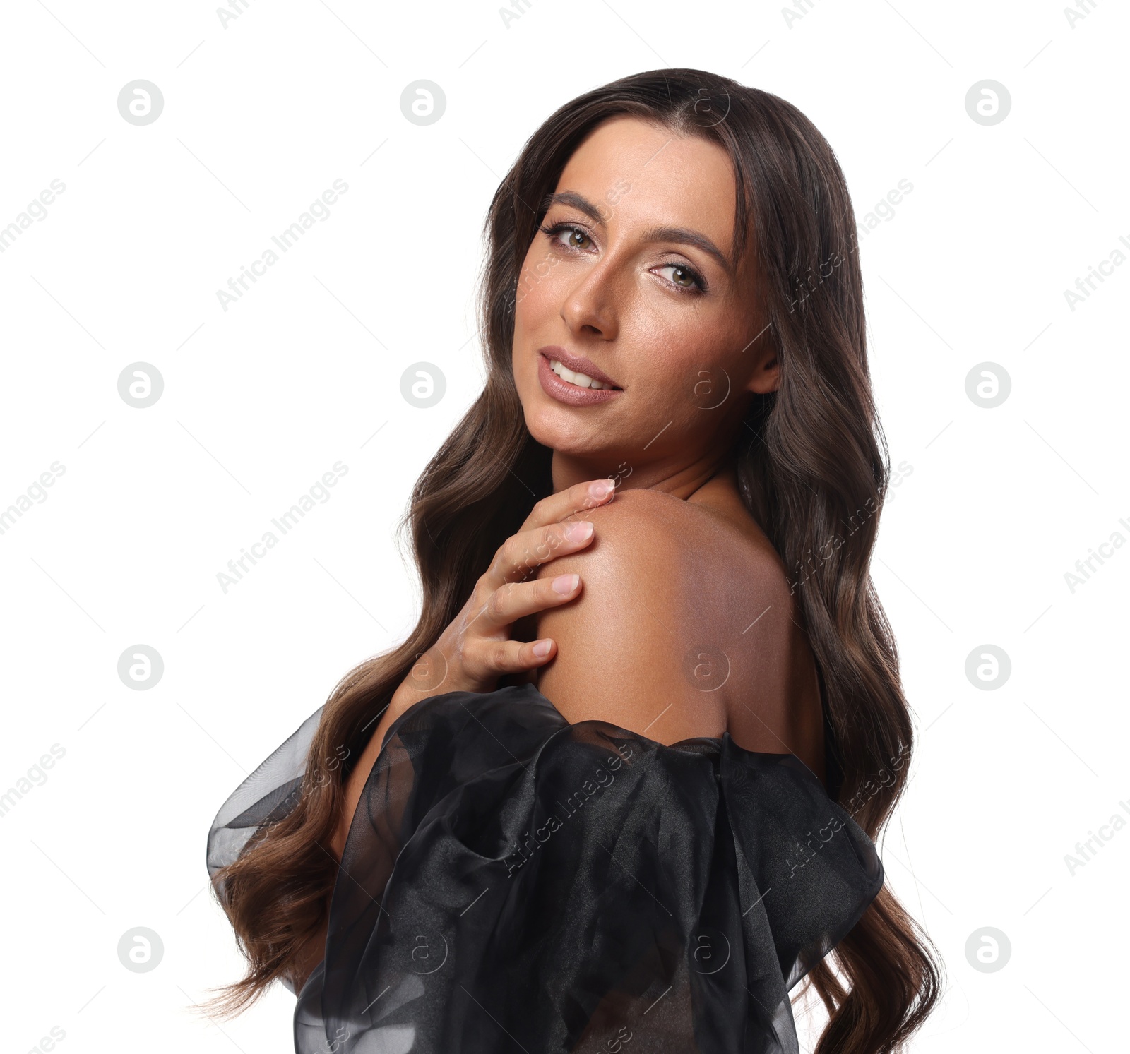 Photo of Hair styling. Portrait of beautiful woman with wavy long hair on white background