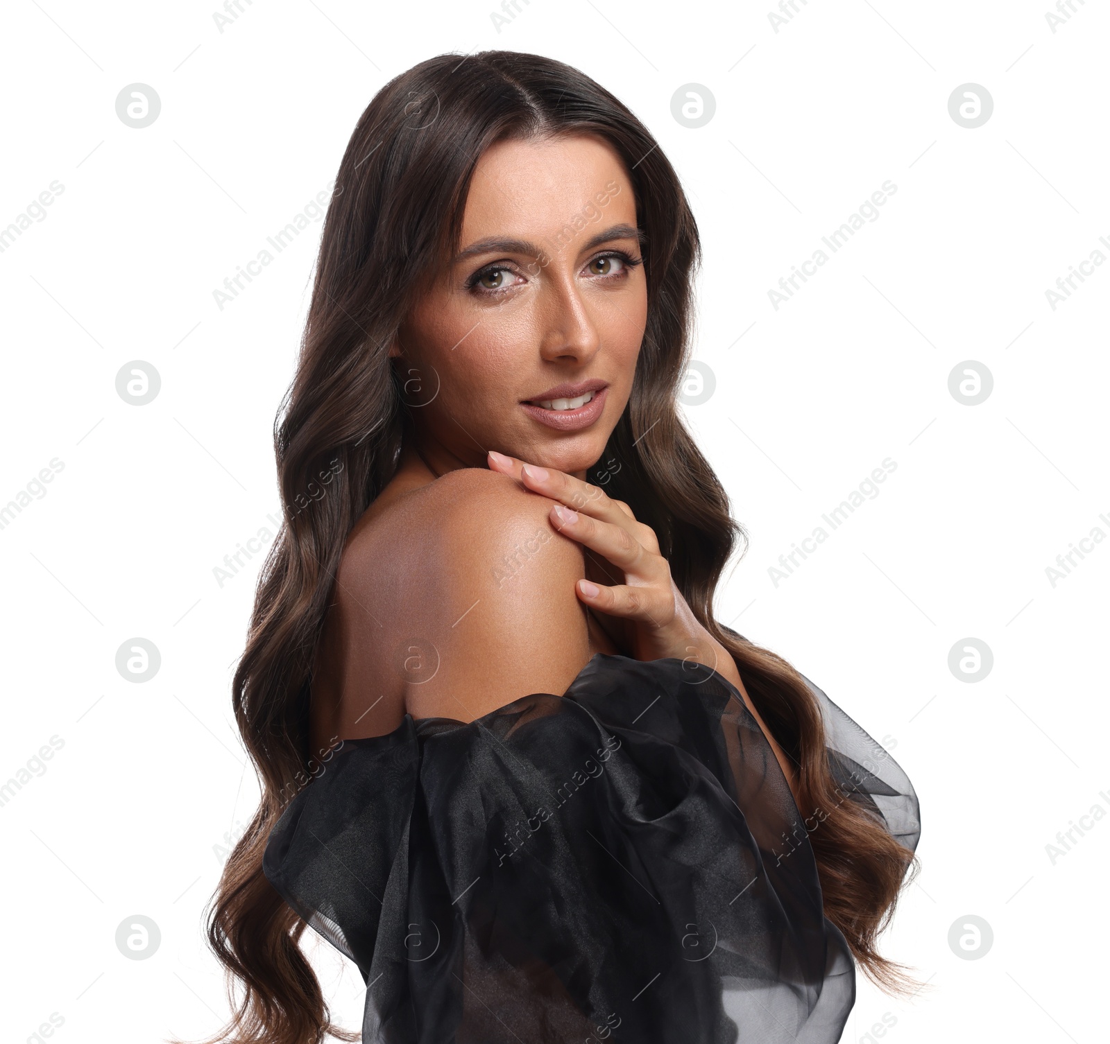 Photo of Hair styling. Portrait of beautiful woman with wavy long hair on white background