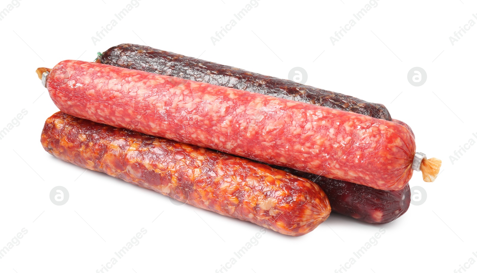 Photo of Many different dry cured sausages isolated on white