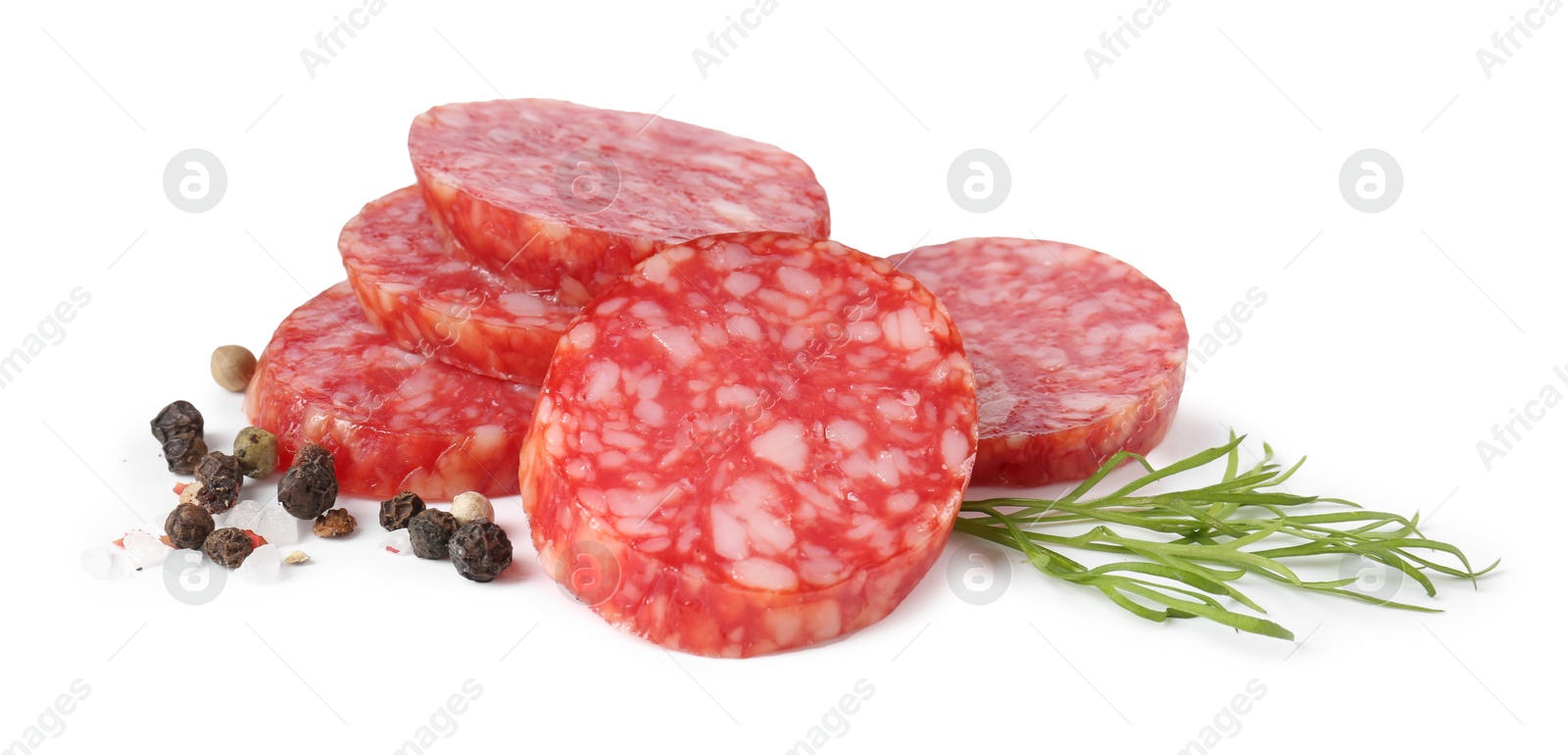 Photo of Pieces of delicious smoked sausage and spices isolated on white