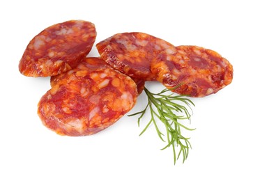 Photo of Pieces of delicious dry cured sausage and dill isolated on white