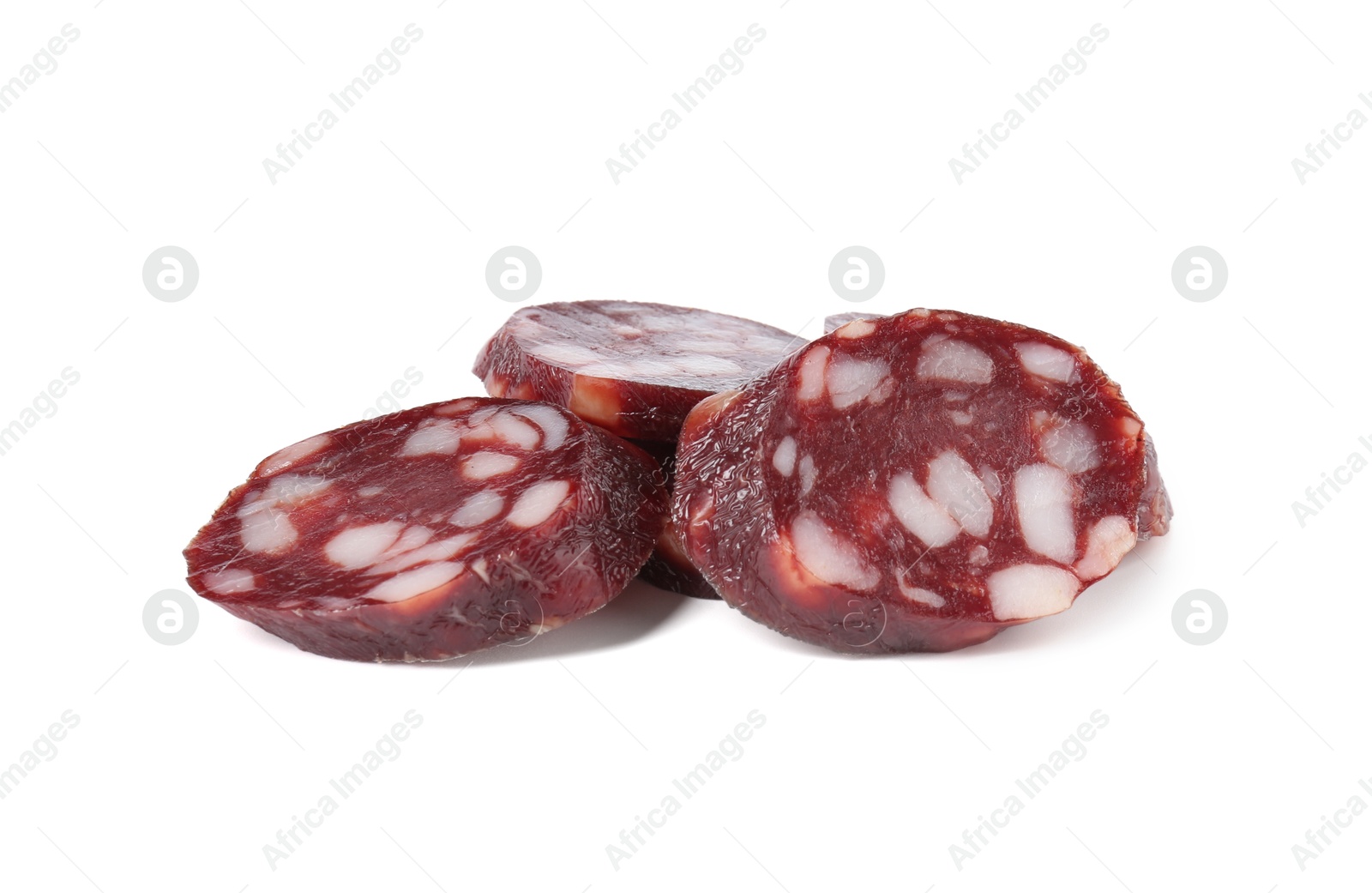 Photo of Pieces of delicious dry cured sausage isolated on white