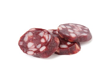 Photo of Pieces of delicious dry cured sausage isolated on white