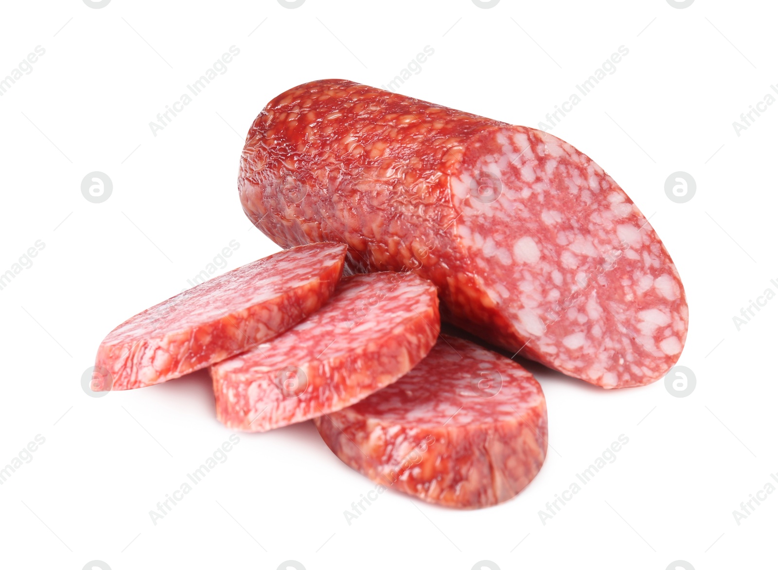 Photo of Pieces of delicious smoked sausage isolated on white