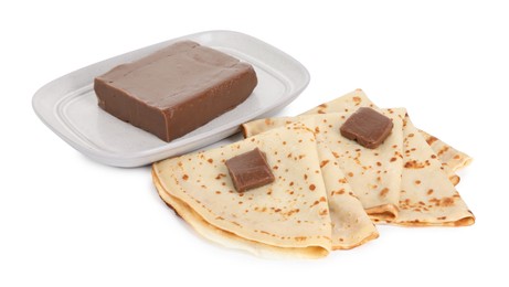 Tasty crepes with chocolate butter isolated on white