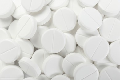 Photo of Pile of antibiotic pills as background, closeup