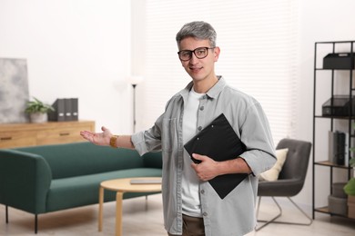 Photo of Portrait of professional psychologist with clipboard in office