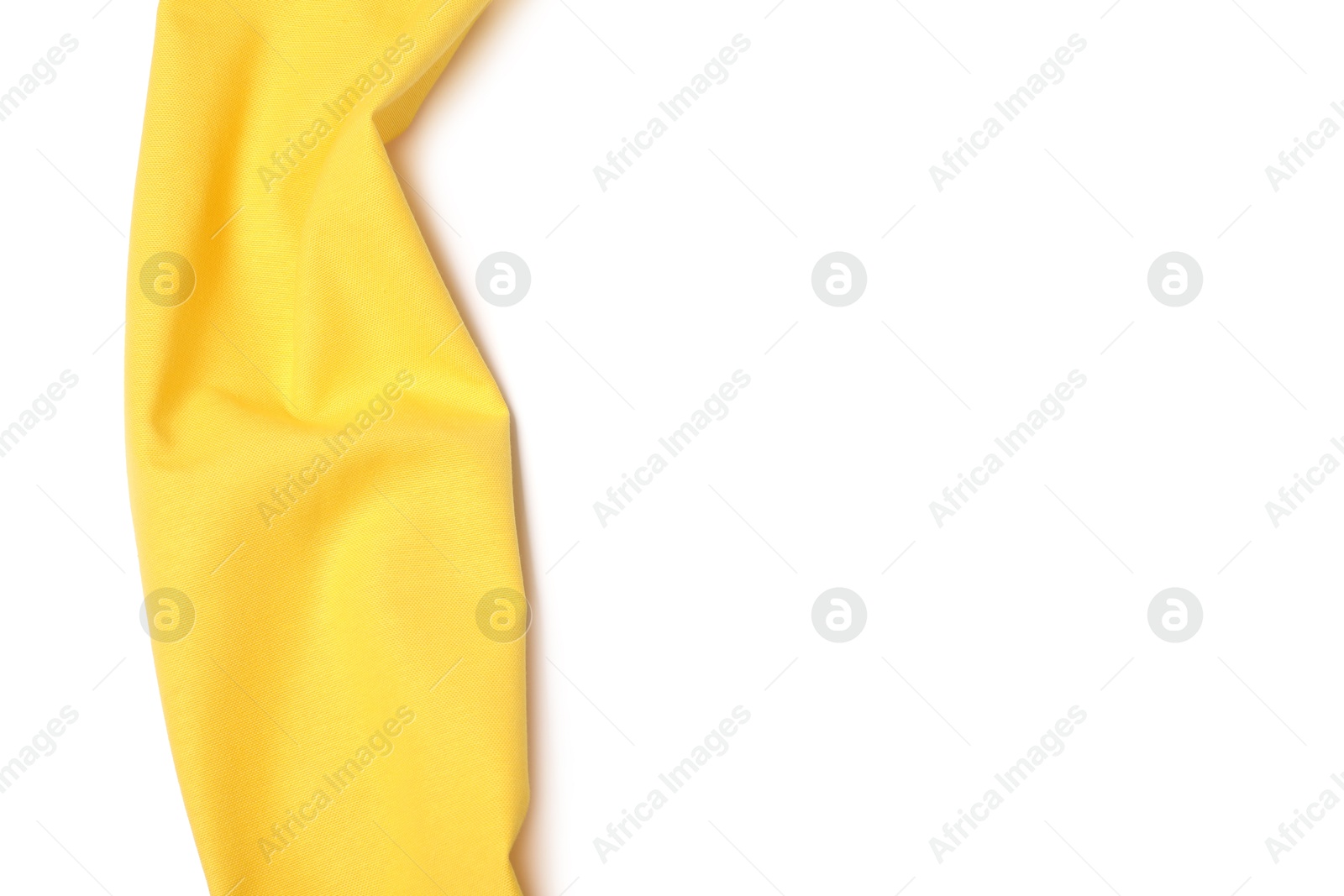 Photo of Yellow tablecloth isolated on white, top view