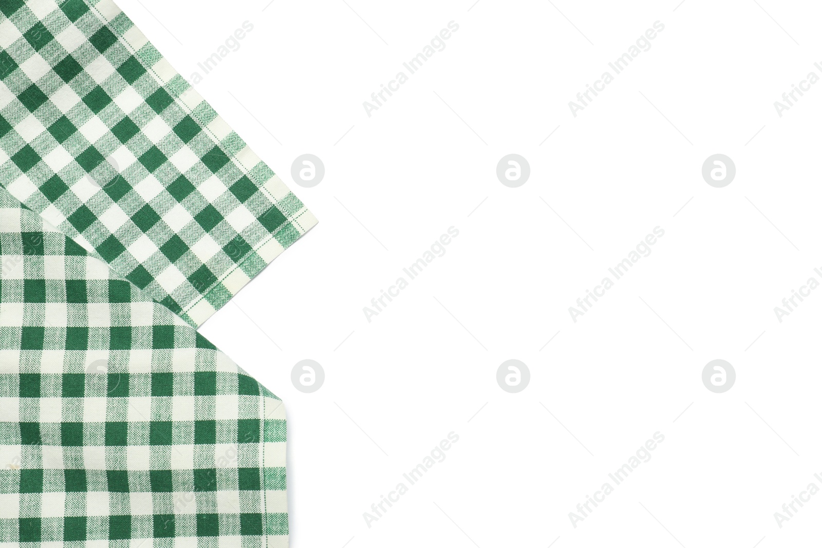 Photo of Green checkered tablecloth isolated on white, top view