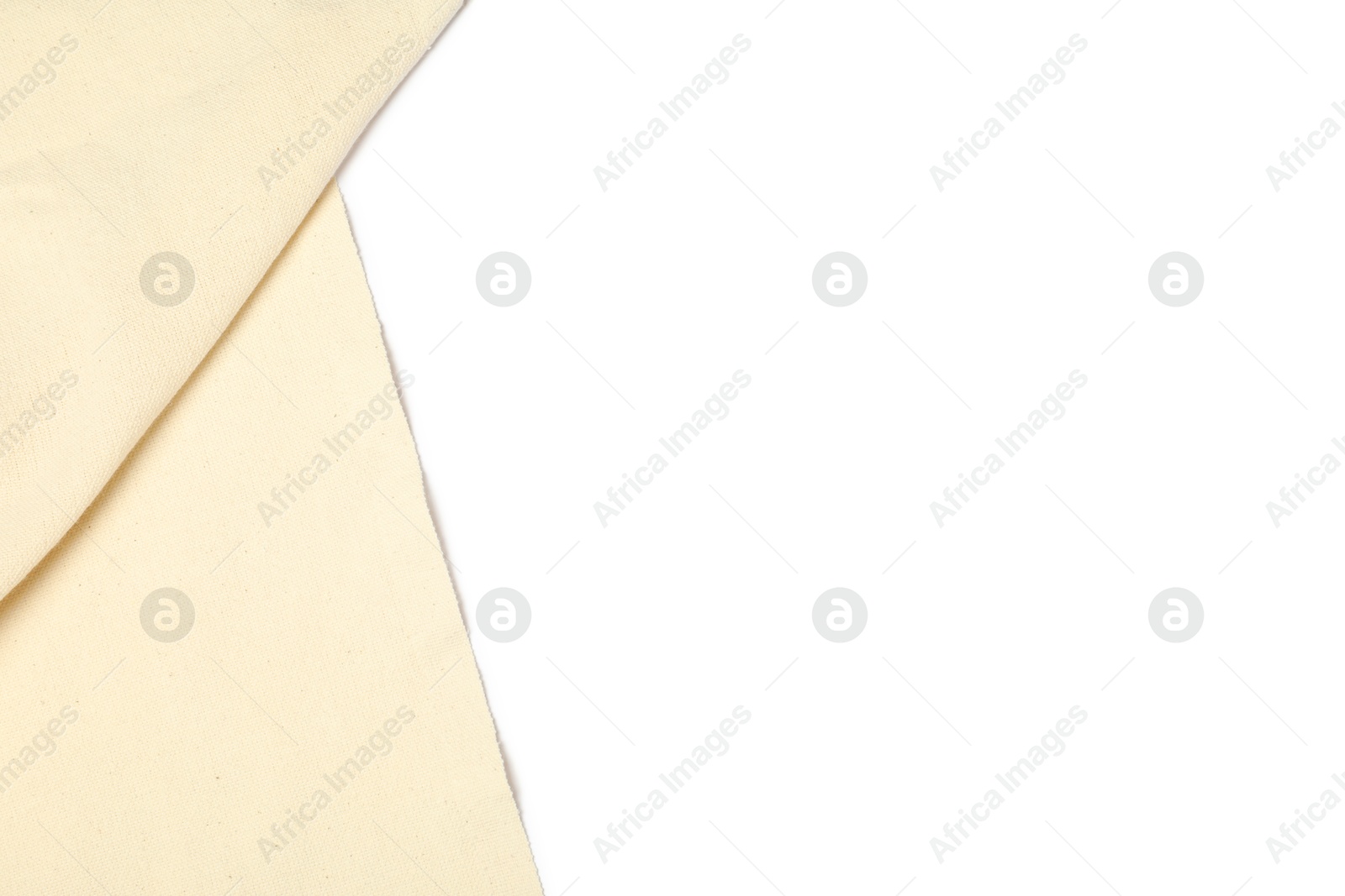 Photo of Beige tablecloth isolated on white, top view