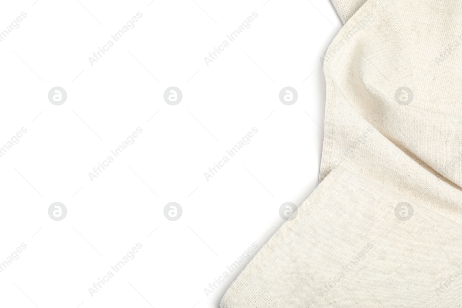 Photo of Beige tablecloth isolated on white, top view